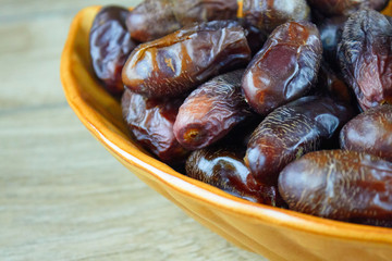 sweet algerian arabic dates fruits on a plate