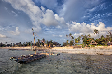 Fototapeta na wymiar Beautiful sunset on the beach of the Indian ocean, Zanzibar island