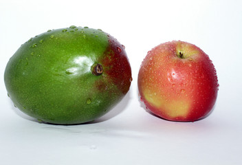 Mango and red Apple on white background