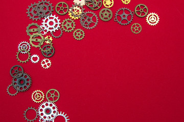 Steel gear gears on a Red background.