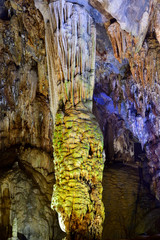 Amazing geological forms in Paradise Cave near Phong Nha, Vietnam. Limestone cave full of stalactites and stalagmites.