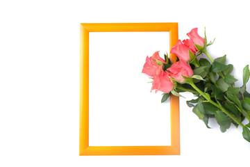 Photo frame with flowers of roses, isolated on white background.