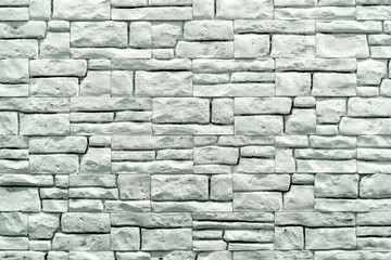 Texture of the stone wall. Background for design and decoration.