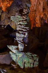 Amazing geological forms in Tien Son Cave near Phong Nha, Vietnam. Limestone cave full of stalactites and stalagmites.