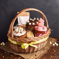 Congratulatory Easter cake in the basket, Traditional Kulich, Paska  ready for celebration