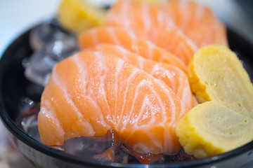 Raw salmon slice or salmon sashimi
