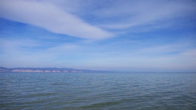 Beautiful landscape view of Baikal lake blue sky and clean transparent water wave in Olkhon island, Irkutsk Russia