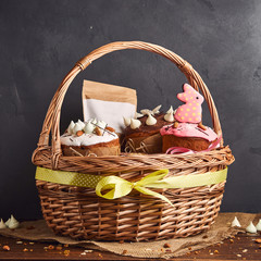 Congratulatory Easter cake in the basket, Traditional Kulich, Paska  ready for celebration