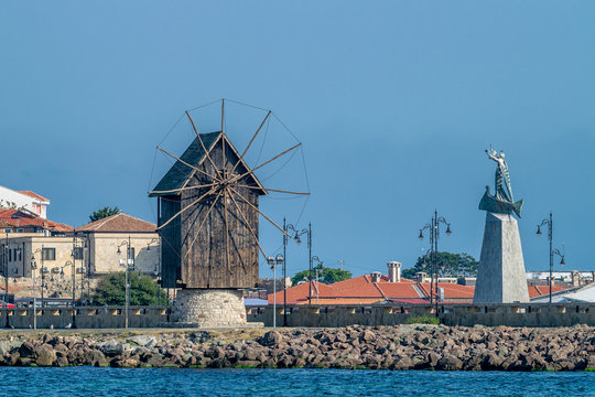 The wooden windmill on the isthmus Nessebar ancient city, one of the major seaside resorts on the Bulgarian Black Sea Coast. Nesebar or Nesebr is a UNESCO World Heritage Site. The windmill in Nessebar