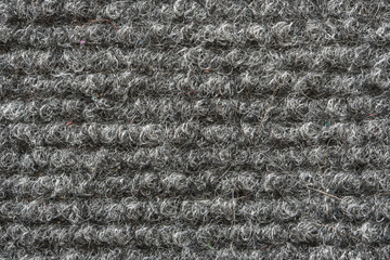 Texture of the Gray Nylon Carpet. Textile Background with Copy Space