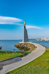 Statue of St. Nicholas in Nessebar ancient city, one of the major seaside resorts on the Bulgarian Black Sea Coast. Nesebar or Nesebr is a UNESCO World Heritage Site. Sunny day with blue sky