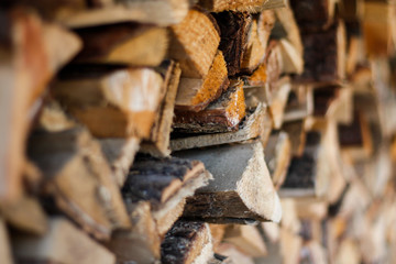 Beautiful countryside view of stacked texture wood.