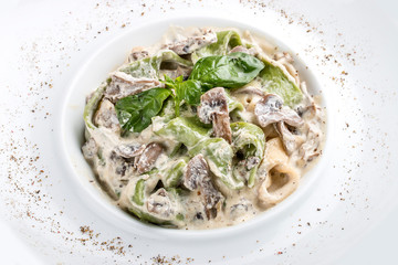 Tagliatelle with mushrooms. Traditional Italian dish