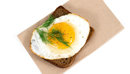 .fried egg with bread and sprinkle on white background