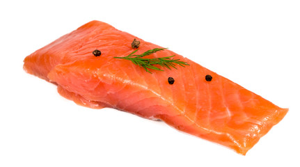 .red fish with herbs and pepper on white background