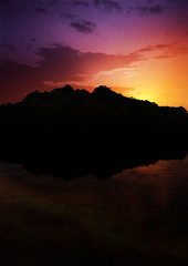 gloomy and dark sunset in the mountains with dark shadows