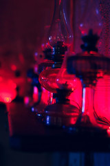  kerosene lamps on shelves