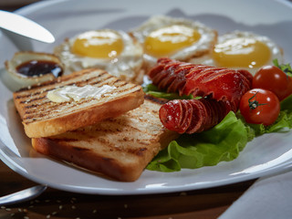 Fried eggs with sausage.