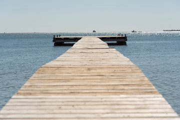 Obraz premium Wooden pier in the Mar Menor for light boats in Murcia, Spain