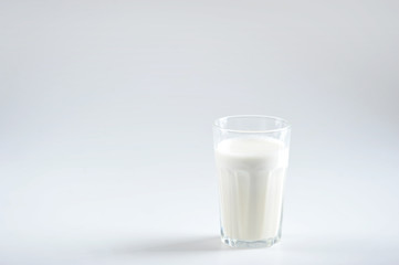 Protein shake for playing sports. Light background close up. Free space to place text. Negative space.