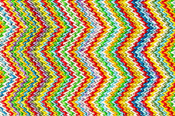 Abstract textured zigzag background of close up detail in woven raffia