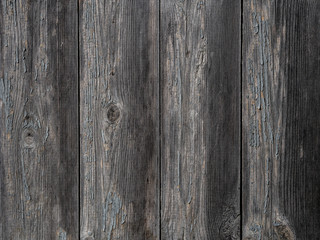 Obraz premium Wooden fence. Gray background with the texture of wet wood.