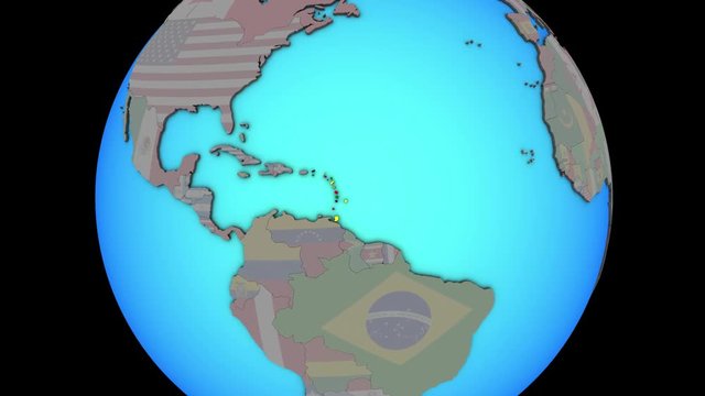 Closing in on Caribbean with embedded national flag on blue political 3D globe. 3D illustration.