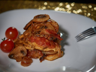 Fresh beef with fried mushrooms.