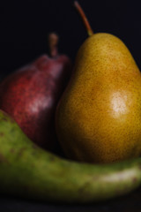 Fresh pears. Pears harvest. Fruit background. Fresh organic pears on old sacking. Nature concept. Dark mood. Close up.