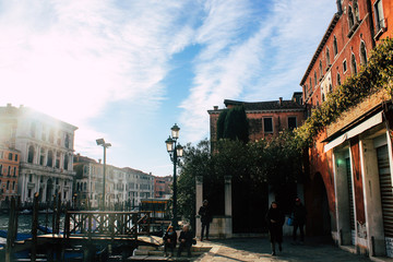 Naklejka premium Grand Canal in Venice on a sunny day, Italy. Venice in the sunlight. Scenic panoramic view of Venice in winter. Cityscape and landscape of Venice. Romantic water trip.