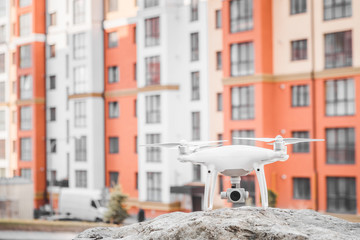 Drone with camera flying on Construction site