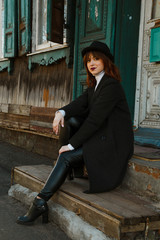 Girl sitting on the stairs