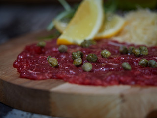 Carpaccio with meat sauces.