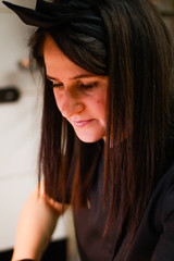 Portrait of a girl chef. Woman in black uniforms. Meet the restaurant chef.