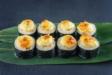 Rolls on bamboo leaves on shale Board