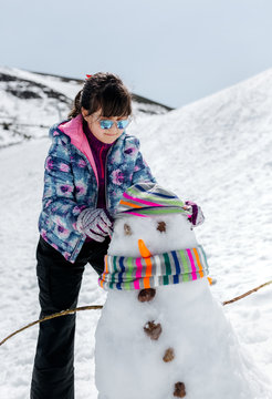 Little girl in the snow