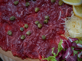 Carpaccio with meat sauces.