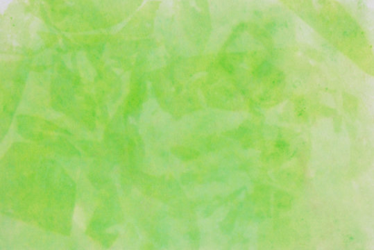 green watercolor pastel painted on paper background texture