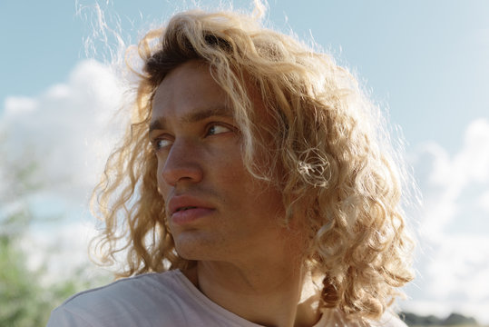 Handsome blond man in sunshine
