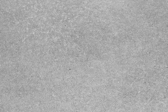 Graue Zementwand, Steinwand, Betonwand, strukturierter Hintergrund