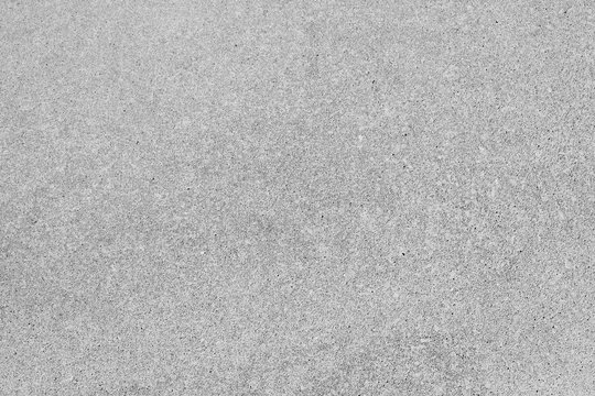 Graue Zementwand, Steinwand, Betonwand, strukturierter Hintergrund