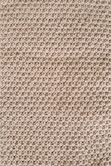 Knitted background. Knitting pattern of wool. Knitting. Texture of knitted woolen fabric 