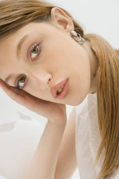 Dreamy studio portrait of young female.