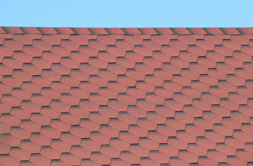 Decorative metal tile on a roof