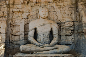 Fototapeta na wymiar Buddha sculpture in the Gal vihara stone temple in Polonnaruwa in Sri Lanka