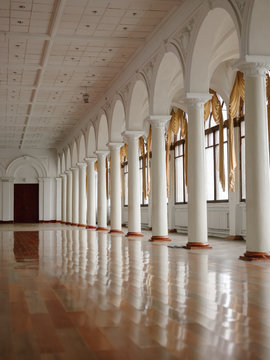 Row of columns in light ballroom