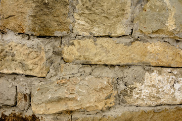 Cement blocks are laid out with a wall, a texture