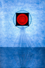 Abstract still life with transparent objects on blue background