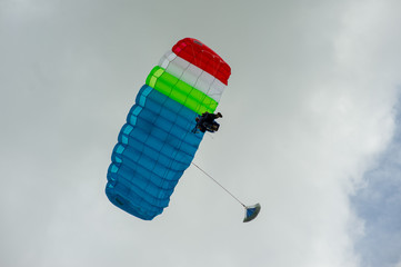 man with parachute in the sky