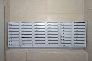 A lot of new mailboxes are still without locks in an apartment building